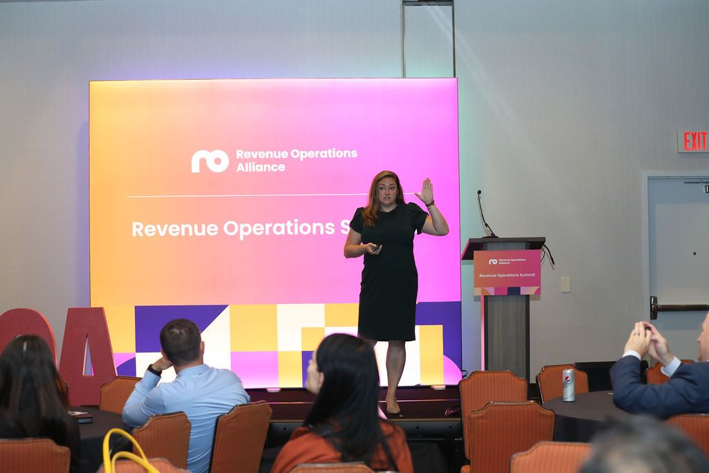 Jenn Glabicky, Head of Revenue and Sales Enablement at Fidel API at the Revenue Operations Summit in San Francisco